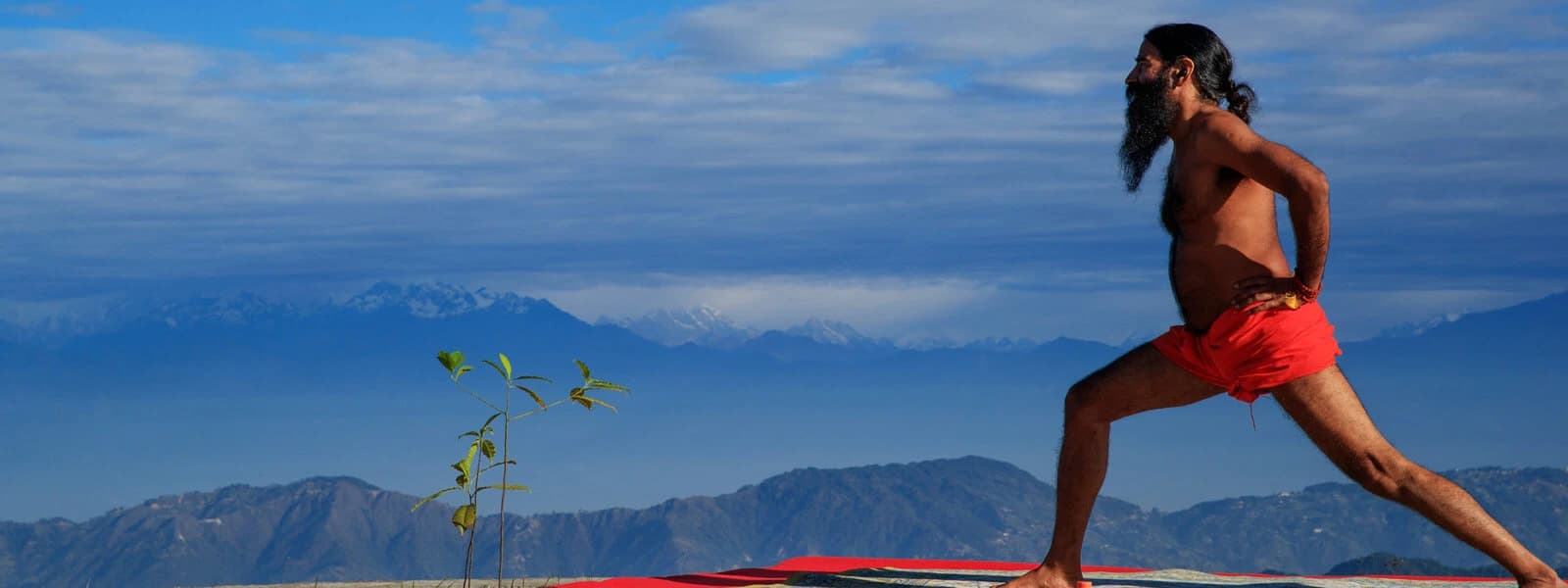 Baba Ram Dev practicing meditating on the lap of Himalayas on a Nepal yoga trekking expedition