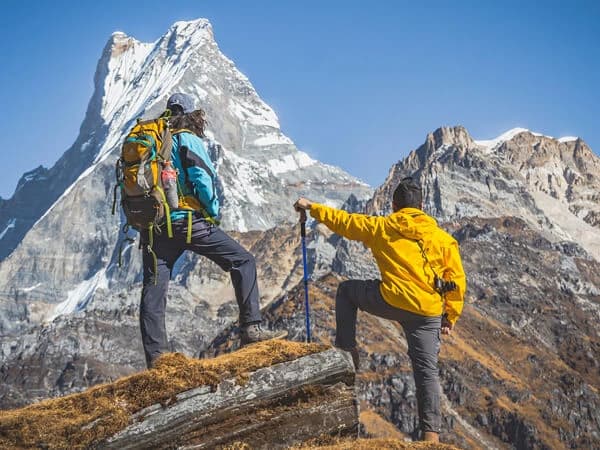 Trekkers on the Mardi Himal Trek enjoying expansive Himalayan vistas